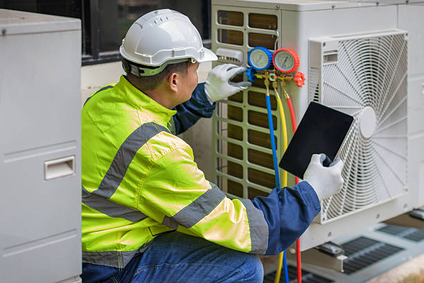 Professional Ac Installation technician working in Pinehurst, MA